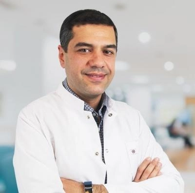 DR. KAMRAN SALAYEV